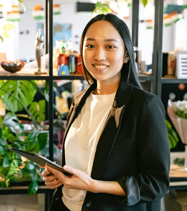 Stealth Agents Filipina virtual assistant smiling in professional office